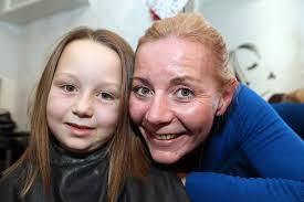 Emily Bone had her hair cut in aid of the Toma Fund