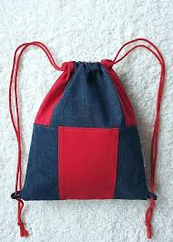 Clever And Comfortable Bag Jeans Backpack In Gray Graphite With Red Inserts The Backpack Has Been Designed So That Canta Tasarimi Canta Modelleri Cuzdanlar