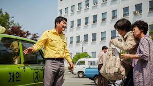 A cab driver in seoul takes a german reporter to investigate rumors of civil unrest in gwangju not knowing what awaits them there. A Taxi Driver 2017 Directed By Jang Hoon Reviews Film Cast Letterboxd