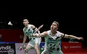 Shuttler Aaron thrives on packed schedule, dismisses burnout fears