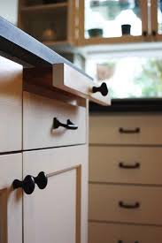 These black kitchen pulls stand out in the kitchen and gives contrast to the perfectly white cabinets. 5 Black And White Kitchen Remodel Trends Hammer Hand