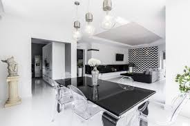 Browse our bar stools and loungers to add an extra something to your home. Modern Black And White Dining Room With Black Table And Clear See Through Chairs Black And White Dining Room Modern Dining Room White Dining Room