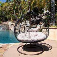 Our hanging chaise lounger chair with adjustable umbrella and built in pillow, allow for indoor and outdoor use. Bay Isle Home Cutright Double Swing Chair With Stand In 2021 Patio Swing Chair Swing Chair Outdoor Swinging Chair