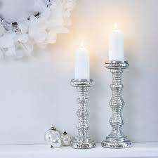 Free shipping on orders over $35. Silver Glass Pillar Candle Holders By Primrose Plum Notonthehighstreet Com