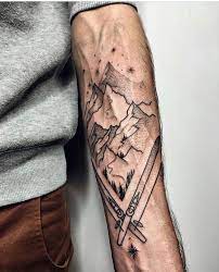 Mountain Landscape Skiing Forearm Tattoo Arm Tattoos For Men Man Wearing Grey Blouse In 2021 Tattoos For Guys Mountain Range Tattoo Mountain Tattoo