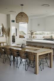 Tropical Kitchen With Sleek White Cabinets Rattan Dining Chairs Kitchen Dining Room House Interior
