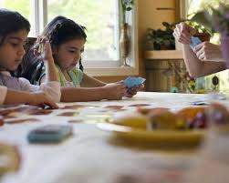 If you're gonna try out bingo, these bingo stampers are a hit with the kids and holiday candy is a hit with the adults for markers. 5 Great Games To Play At The Table