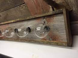 There is a wide variety of options which you can choose from, including bath bars and vanity lights. The Buffalo Creek Rustic Barn Wood Bar Strip Bathroom Vanity Etsy Rustic Bathroom Lighting Rustic Bathroom House Decor Rustic