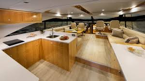 Just make a custom model which can put a small long chair and you can store the chair on the kitchen island. 575 Suv Riviera Australia S Premium Luxury Motor Yacht Builder