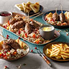 Lamb koftas and couscous salad. Mediterranean Couscous Red Quinoa And Lamb Kofta Bowl Recipe Simplot Foods