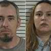 Couple charged with child abuse after body found in Statesville home