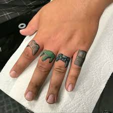 Peter moore, then microsoft's vice president over the xbox division, shows off a halo 2 tattoo backstage at e3 2004, in an image widely circulated the past 15 years. Xbox In Tattoos Search In 1 3m Tattoos Now Tattoodo