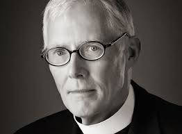 Cathedral dean leads assault-weapon ban press conference in prayer