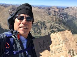 What is the record for the oldest person to summit any of the Colorado  14ers?