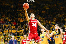 college basketball rankings wisconsin rises furman ranked