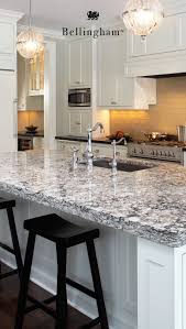 That option will be expensive and averages between $45 and $200 per square foot. This Large Cambria Bellingham Island Is Ideal For Entertain Replacing Kitchen Countertops Grey Granite Countertops Granite Countertops With White Cabinets Grey