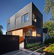 Modern shou sugi ban house. 5 Majestic Houses Wrapped In Black Wood Cladding Designlines