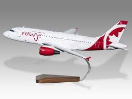 Air canada rouge is a subsidiary aviation provider in canada, provided by air canada to provide service to the united states, europe and the caribbeans/central america. Airbus A319 Air Canada Rouge Solid Mahogany Wood Handcrafted Display Model Ebay