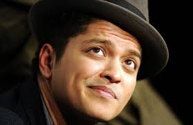 According to reports, Mars&#39; mother, Bernadette Hernandez, died at the Queens Medical Center in Honolulu of a brain aneurysm. - Bruno-Mars-2014