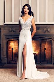Wedding dresses for the chic, trendy, budget conscious bride. Cap Sleeve A Line Crepe Wedding Dress With Slit Kleinfeld Bridal
