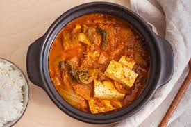 Kimchi Jjigae By Chef Baek Jong Won Chopsticks And Flour Recipe Spicy Stew Pork Broth Stuffed Peppers