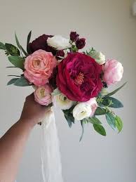 Perfect spring wedding flowers like anemone, anthurium, and ranunculus will work beautifully for a winter wedding, but roses, dahlias, and lilies tend to. Burgundy Bridal Bouquet Burgundy Pink Bouquet Wedding Bouquet Eucalyptus Wedding Flower Bridal Bouquet Flowers Bridal Bouquet Pink August Wedding Flowers