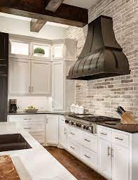 Consider contrast in home design for a moment, a modern piece in a room that's traditional. White Cabinets With Black Countertops 12 Inspiring Designs