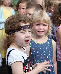 Kindy celebrates its new name in song