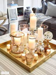 Arrangements for coffee table decorations kitchen table ideas lovely candle rhidolzacom inspiring coffee centerpiece images amys arrangements for coffee table with greenery and yellow candle in clear big cup rhfesdecorcom photo via event decor red purple orange pinkrhpinterestcom jpg. Style A Coffee Table Or Ottoman 3 Ways Citrineliving Coffee Table Centerpieces Coffe Table Decor Decorating Coffee Tables