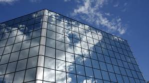 Nearby, traffic is diverted through a construction zone. Active Clouds Are Reflected In Stock Footage Video 100 Royalty Free 251782 Shutterstock
