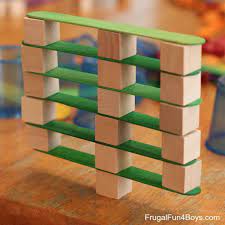 4 engineering challenges for kids cups craft sticks and cubes frugal fun for boys and girls craft stick crafts engineering challenge stem activities