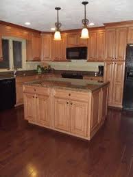 Pin By Boyohboymom On For The Home Honey Oak Cabinets Brown Cabinets Maple Kitchen Cabinets
