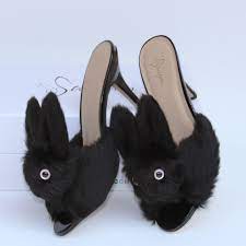 What kind of slippers are good for women? High Heel Bunny Slippers Black Streetzies