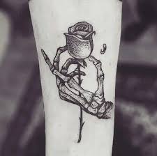 The rose represents life and the sword, death. 9 Terrifying Death Tattoos With Images Styles At Life