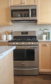 My Sister S New Kitchen Surprise It S Not White Or Subway Tile Maple Kitchen Cabinets Kitchen Cabinet Interior Maple Kitchen
