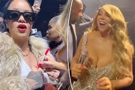 Mariah Carey signs Rihannas breast during final Christmas concert: Who  has a sharpie?