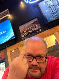 Unlit vapor shop kareoke and pool table