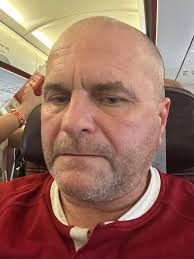 In Bangkok , connecting flight boarded , next stop Phuket