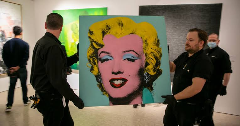 Andy Warhol's Marilyn Monroe portrait sold for record $195 million