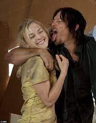 Norman reedus is a 52 year old american actor. The Walking Dead S Norman Reedus With Emily Kinney After Denying Romance Rumours Daily Mail Online