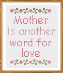 The nice thing about framing your work at home is that you can switch out the cross stitch pieces seasonally and sometimes use the same frames! Mother Is Another Word For Love Cross Stitch