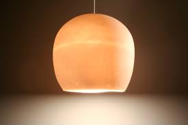 But if you're not one to dig through flea markets and estate sales, then etsy, which offers up a great selection of lighting that can herald back to anywhere from the 1950s to the '80s, is a solid bet for you. 20 Porcelain Pendant Light Treasures