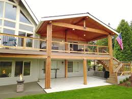 Beyond lighting fixtures and draping lengthy string lights across your pergola, you are able to choose to line your covered patio ceiling with neat rows of rope or any lights of your choice. 75 Beautiful Rustic Outdoor Kitchen Deck Pictures Ideas August 2021 Houzz