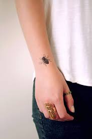 As tattoos, they can be designed alone but are often portrayed with flowers, in a cartoon form, or they may look more realistic. Bumblebee Temporary Tattoo Tattoos By Tattoorary