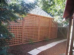 Using Fence And Arbor As Japanese Garden Ornament Fence Design Lattice Fence Garden Privacy