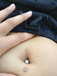Removing a belly button ring is only safe after the piercing is completely healed, and it requires unscrewing the ball at one end and sliding the jewelry out. Is It Possible To Get A Navel Piercing Through Laparoscopic Scar Tissue Does Mine Look Healed Up Enough Got The Surgery On April 4 And Looking To Get A Double Navel Piercing