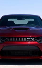 Getting used to the size of it after driving small cars. Download 950x1534 Wallpaper Sports Car Dodge Charger Srt Red Iphone 950x1534 Hd Image Background 9833