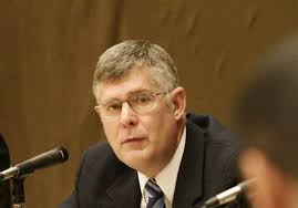 Dozen top officials to quit school system