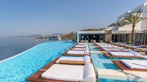 Mykonos is an island in greece, part of the cycladic group located in the aegean sea. Cavo Tagoo Mykonos Hotels In Heaven