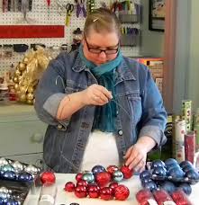 Want to add some more holiday decor to your home in the week leading up to christmas? She Threads Christmas Bulbs On A Hanger Creating A Gorgeous Decoration Everyone Will Want